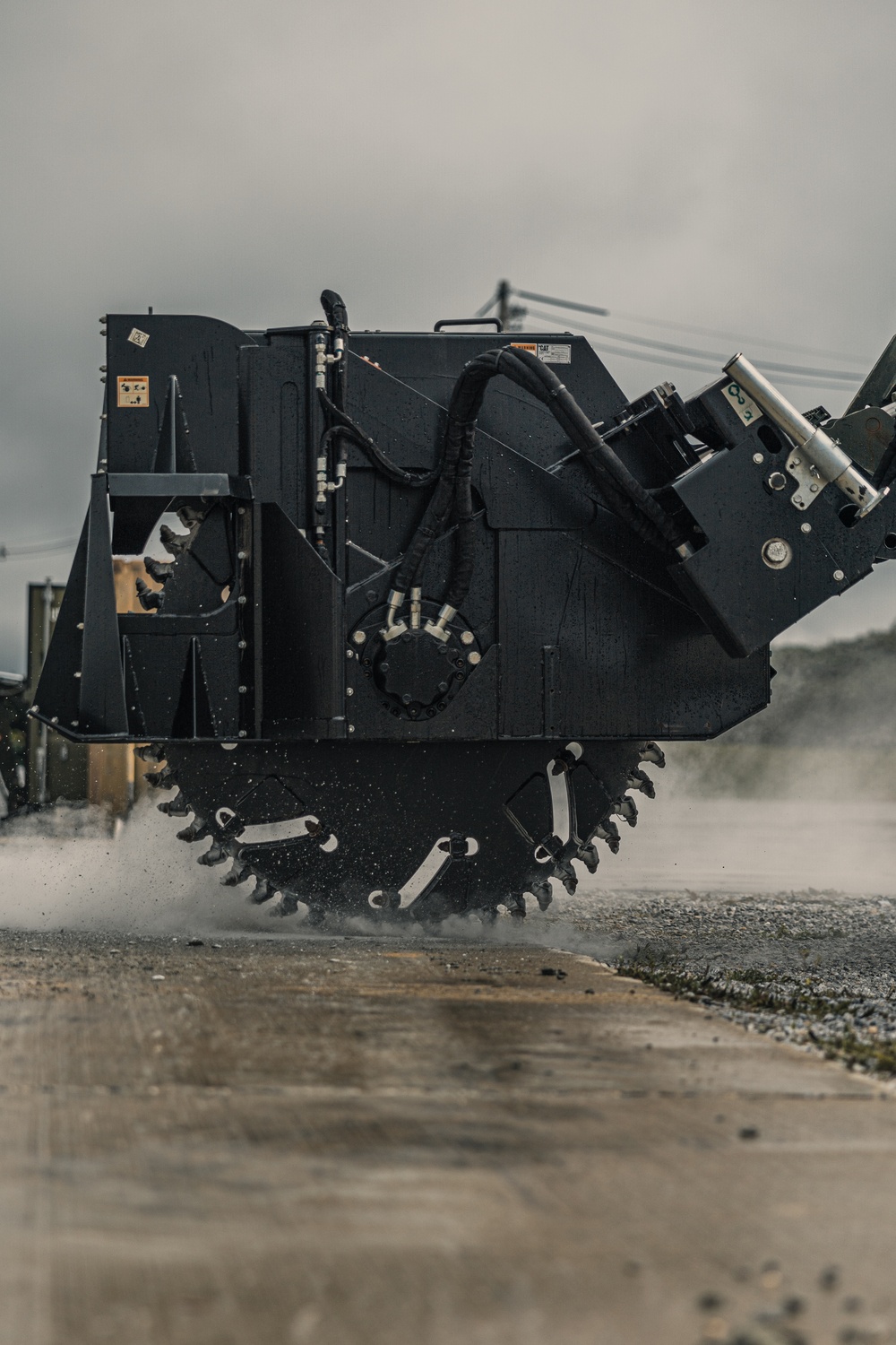 U.S. Marines work with Airmen and Navy Seebees during a joint airfield damage repair exercise