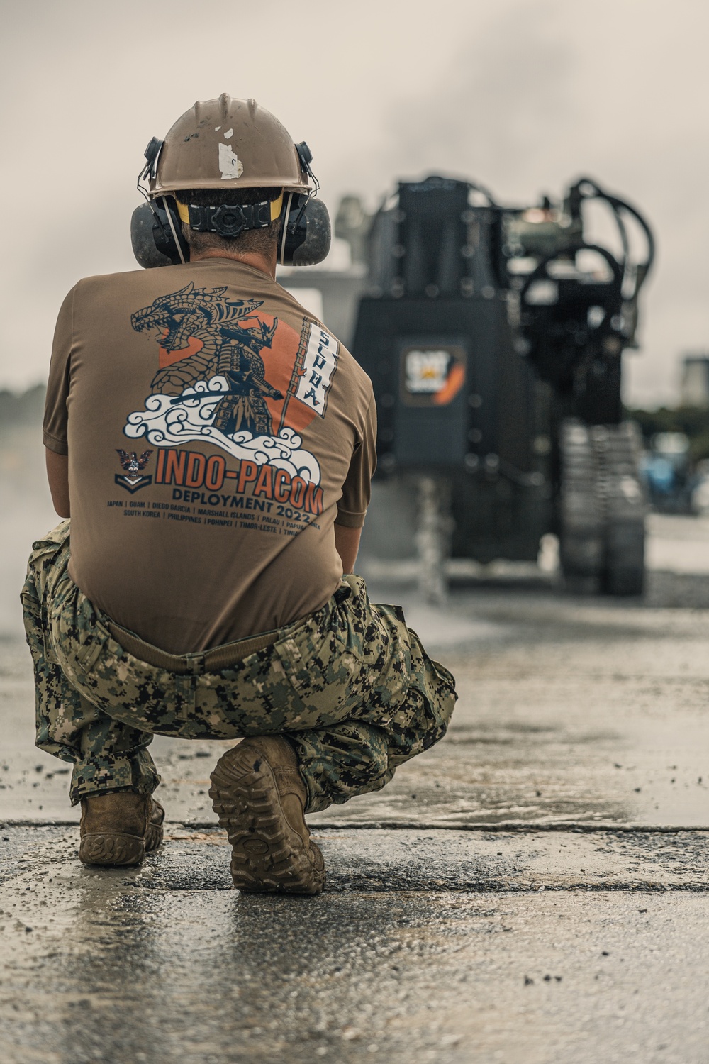 U.S. Marines work with Airmen and Navy Seebees during a joint airfield damage repair exercise