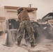 U.S. Marines work with Airmen and Navy Seebees during a joint airfield damage repair exercise