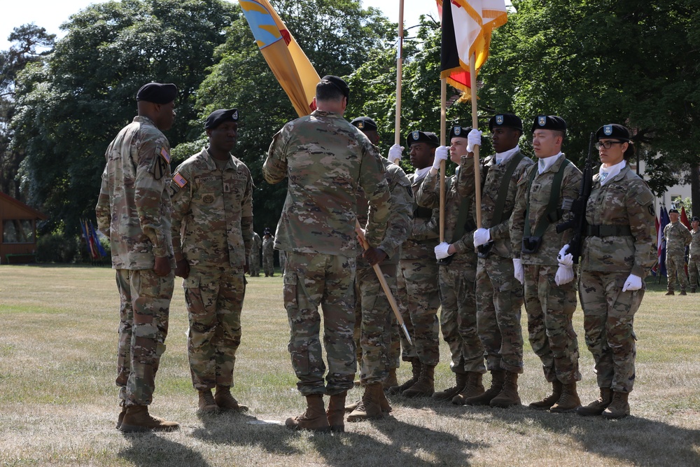 Command Sgt. Maj. Sean Howard receives guidon