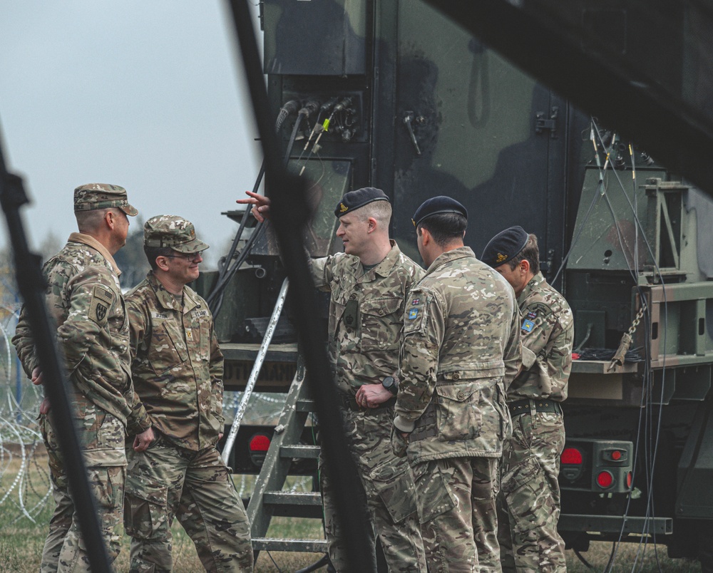 5-7 ADA Command Team talks with the leaders of Great Britain's Sky Saber team