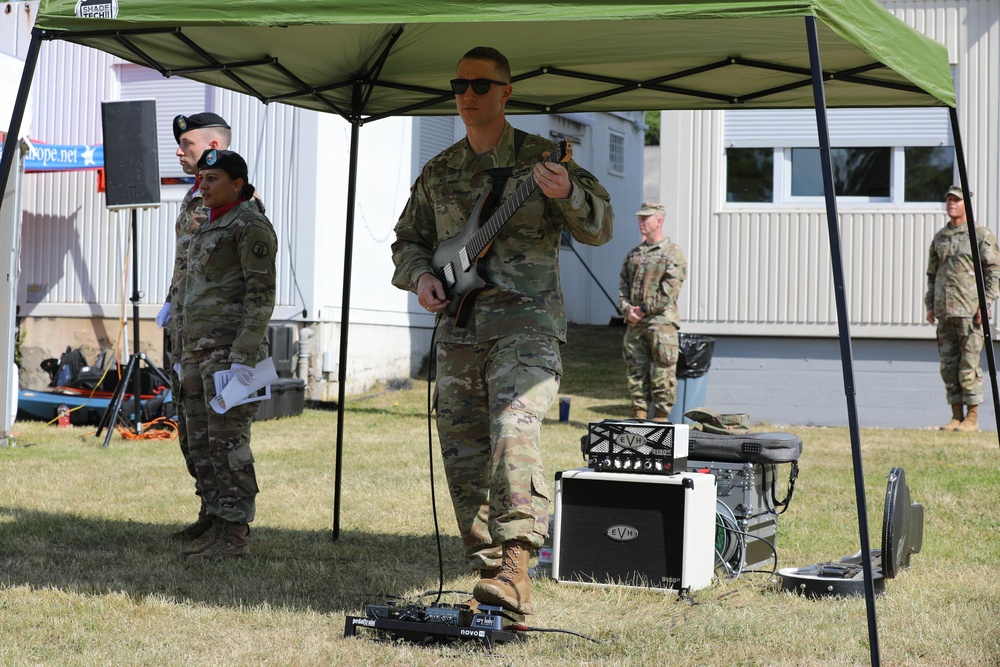 Sgt. James Fox plays US National Anthem at change of responsibility