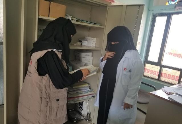 Staff member from USAID Strengthening Family Planning Services (SFPS) in Yemen project delivers infection prevention, control (IPC) materials