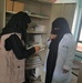 Staff member from USAID Strengthening Family Planning Services (SFPS) in Yemen project delivers infection prevention, control (IPC) materials