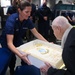 Coast Guard members celebrate 100-year-old WWII Coast Guard veteran legacy