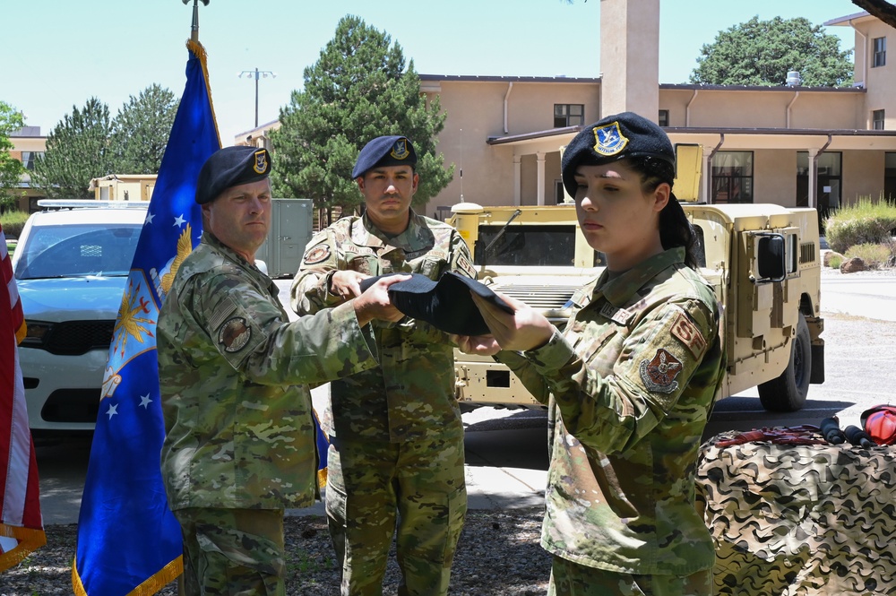 377th SFG finalizes deactivation with furling ceremony