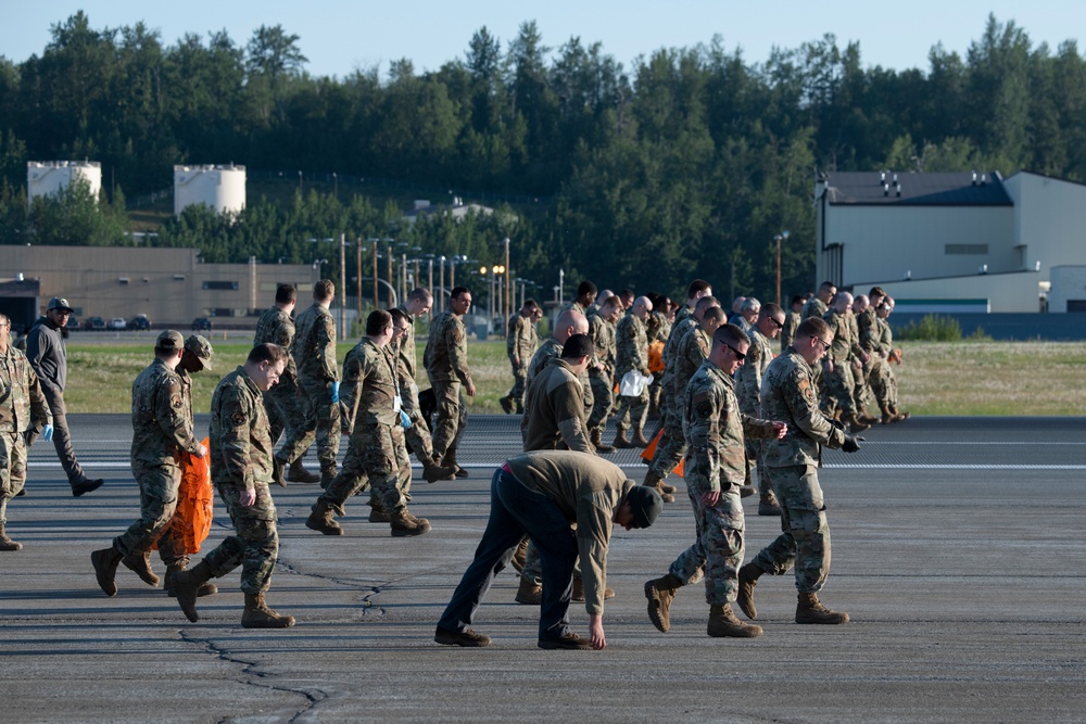 3rd Wing Airmen conduct FOD walk at JBER