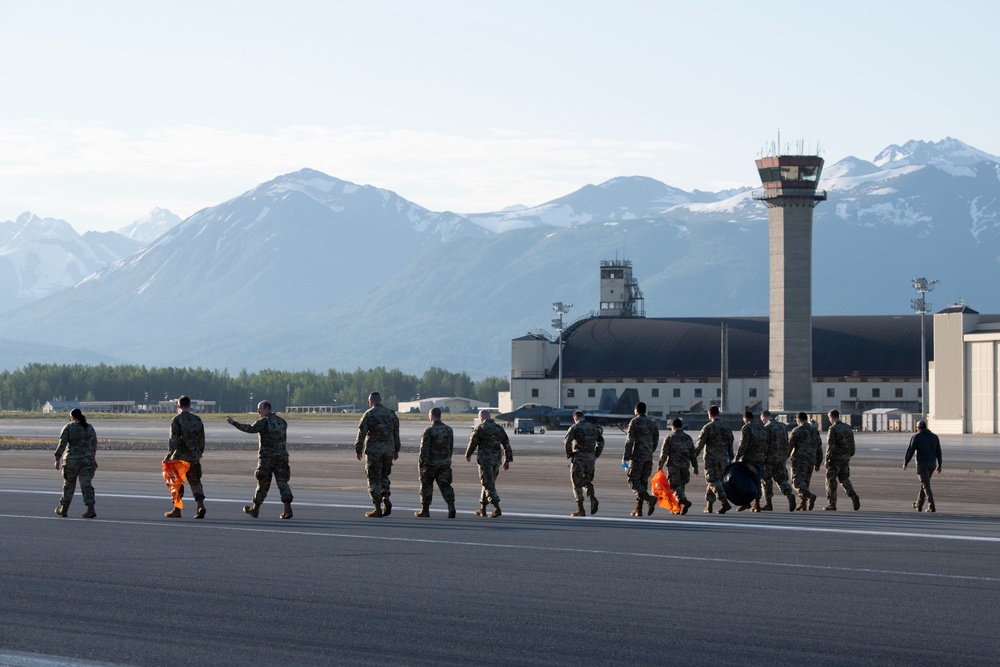 3rd Wing Airmen conduct FOD walk at JBER