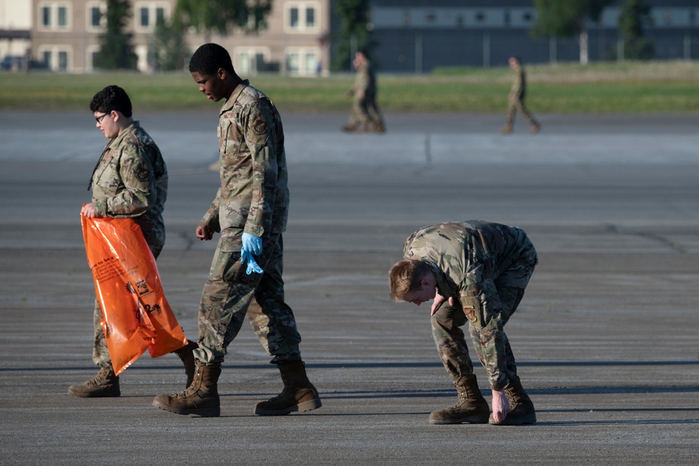 3rd Wing Airmen conduct FOD walk at JBER