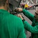 USS George H.W. Bush Sailors Install Equipment