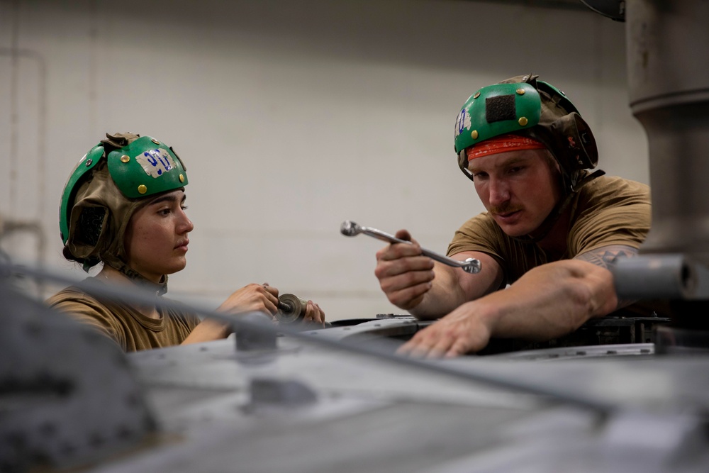 USS George H.W. Bush (CVN 77) Sailor Performs Maintenance