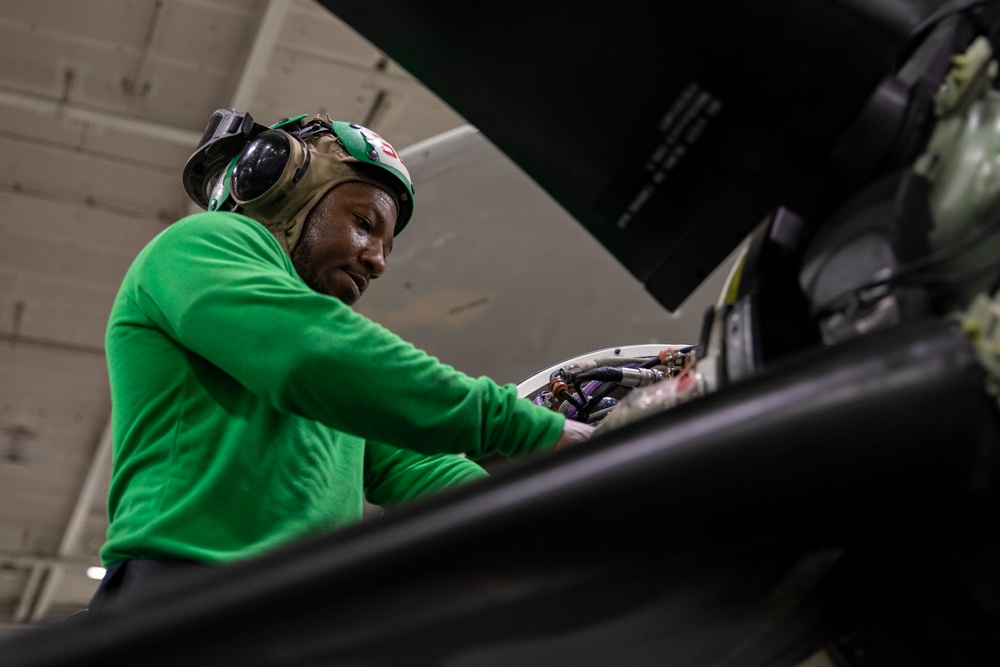 USS George H.W. Bush (CVN 77) Sailor Conducts Maintenance