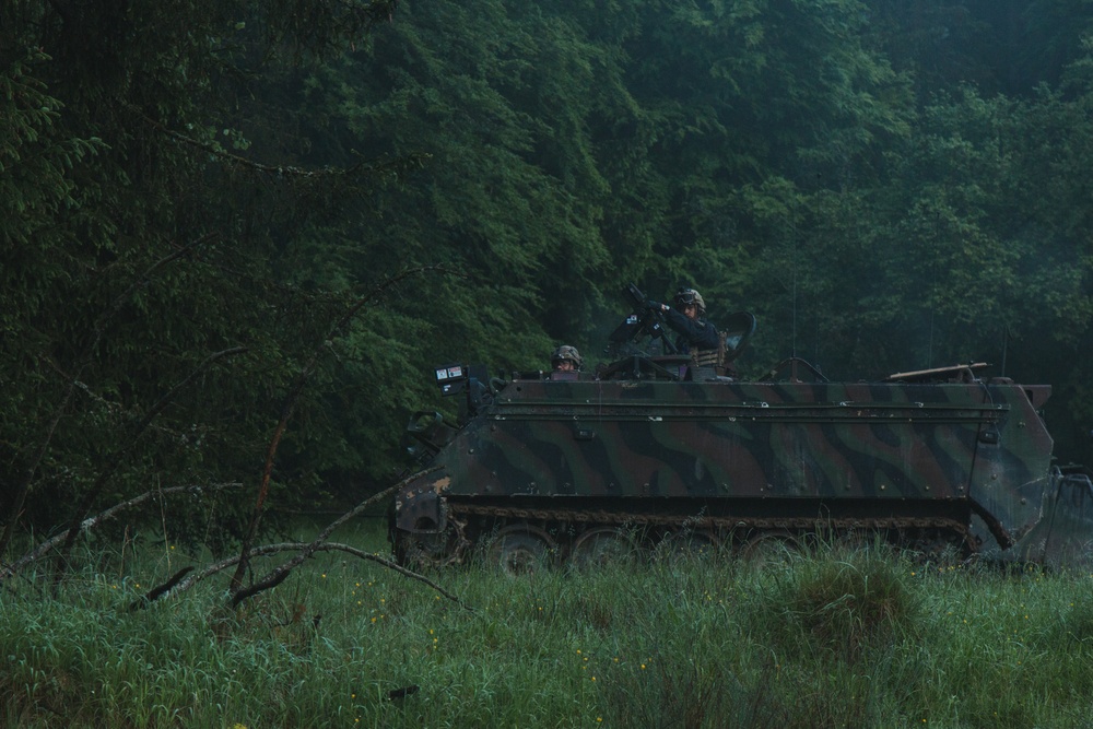 U.S. Soldiers assigned to 1-4 Infantry Regiment conduct a simulated assault in Hohenfels, Germany