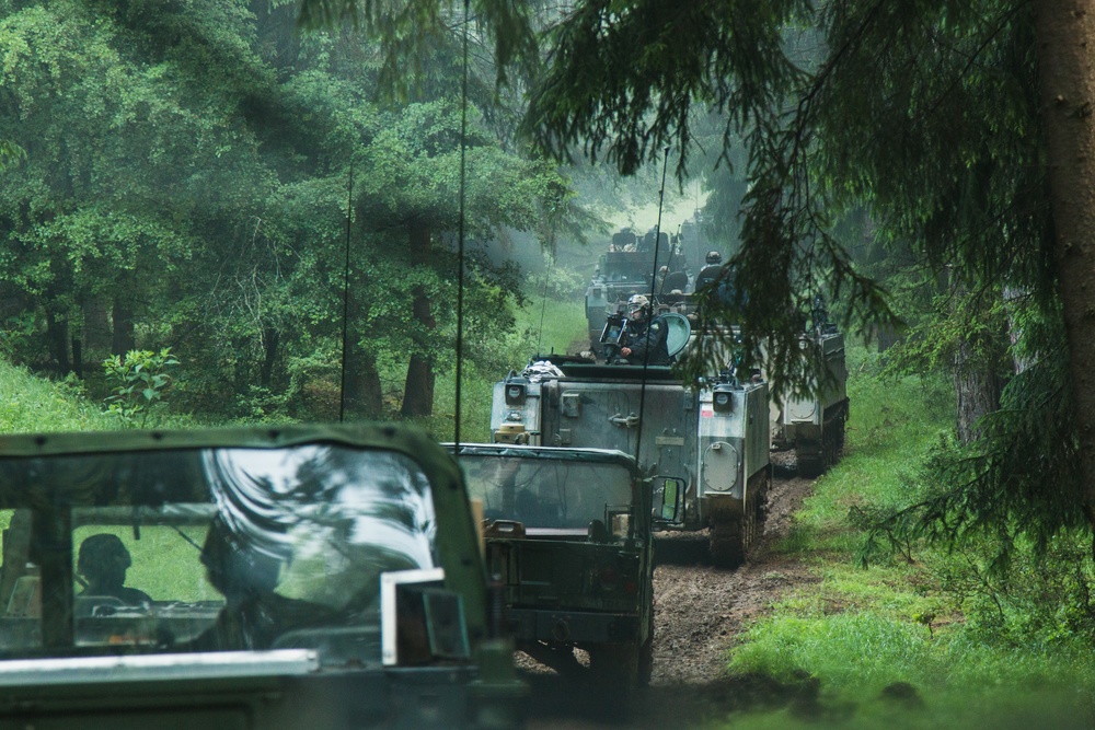 U.S. Soldiers assigned to 1-4 Infantry Regiment conduct a simulated assault in Hohenfels, Germany