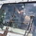 HSM-71 Sailors stow an MH-60R aboard Mobile Bay