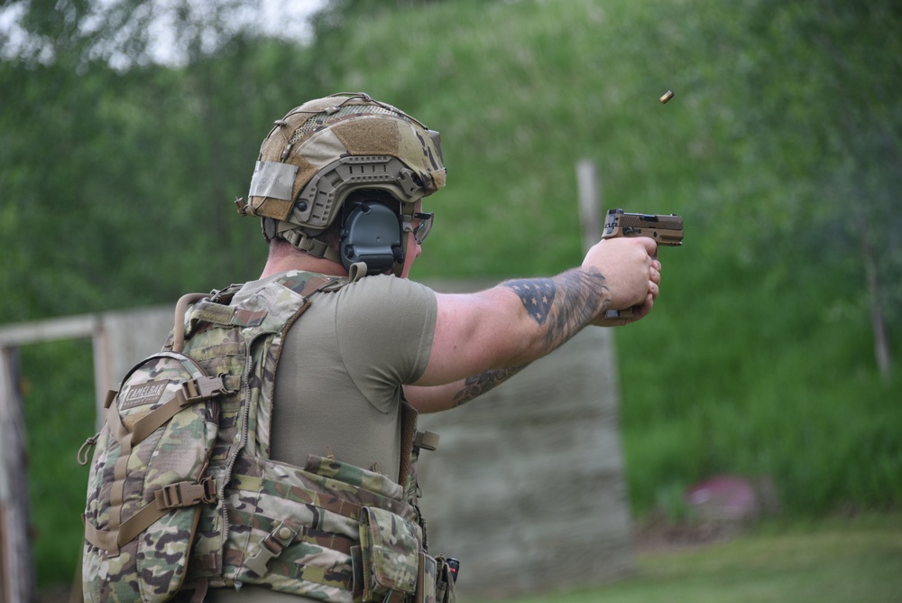 Security Forces Member Fires M18 Pistol