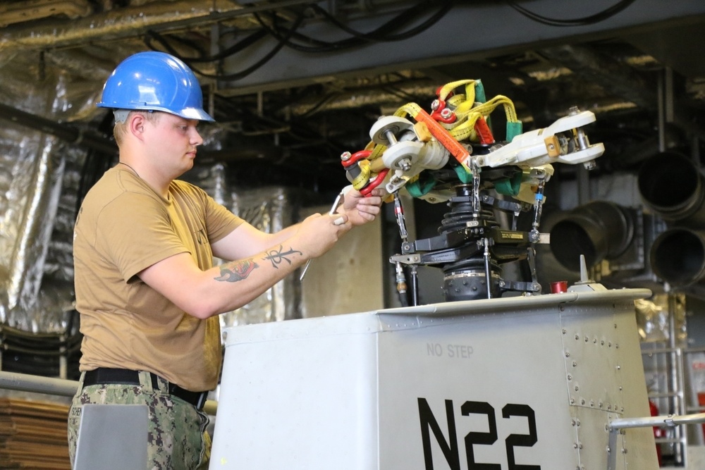 Sailor on USS Billings Maintains MQ-8B Fire Scout