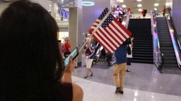 Crowd welcomes home Honor Flight veterans