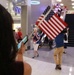 Crowd welcomes home Honor Flight veterans