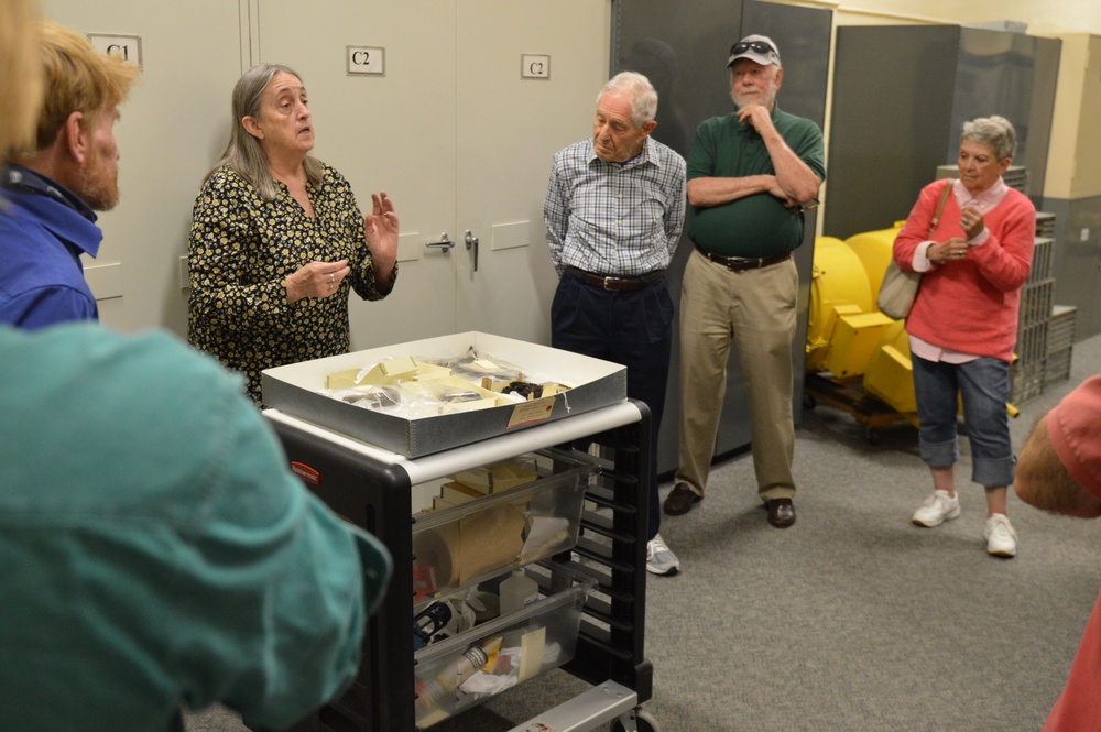 Museum Volunteers get up close glimpse of artifacts recovered from USS Cumberland