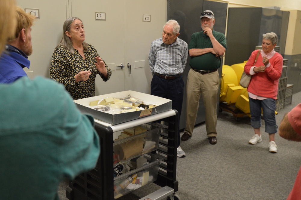 Museum volunteers visit artifact storage facility