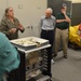 Museum volunteers visit artifact storage facility