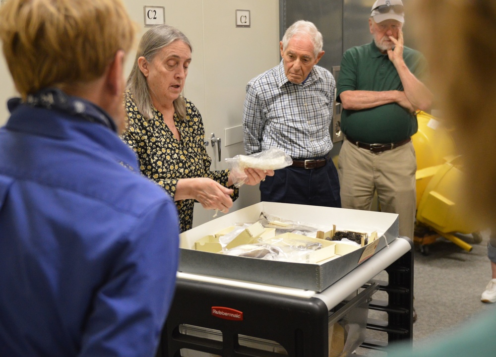 Museum volunteers visit artifact storage facility