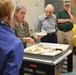 Museum volunteers visit artifact storage facility