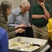 Museum volunteers visit artifact storage facility