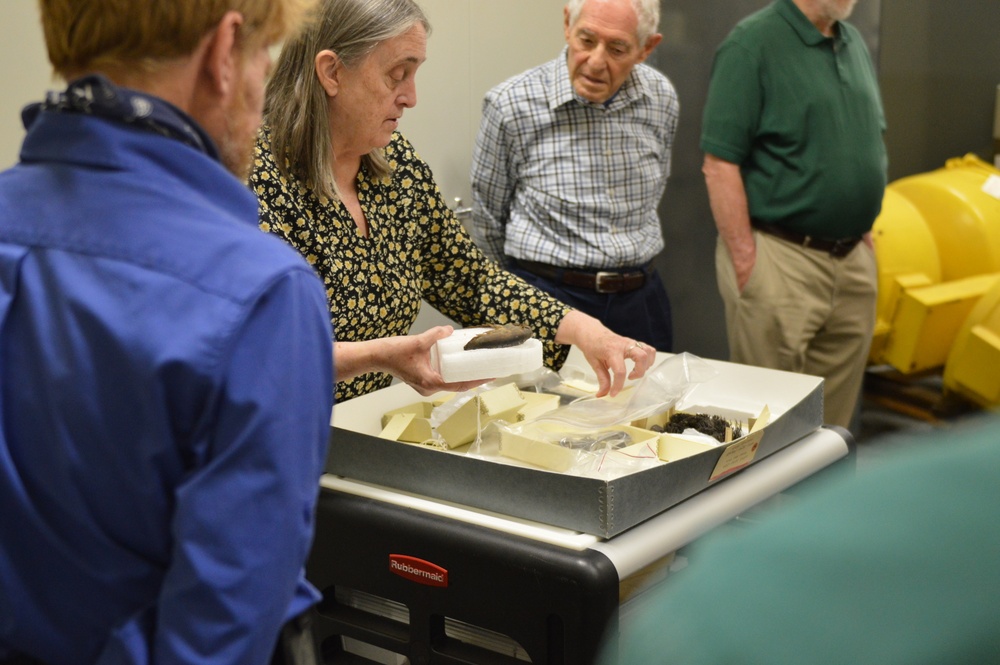 Museum volunteers visit artifact storage facility