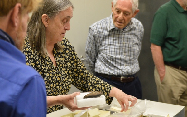 Museum volunteers visit artifact storage facility