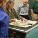 Museum volunteers visit artifact storage facility