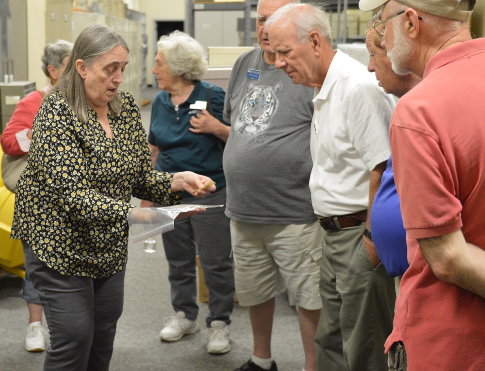 Museum volunteers visit artifact storage facility