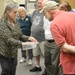 Museum volunteers visit artifact storage facility