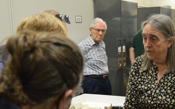 Museum volunteers visit artifact storage facility