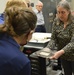 Museum volunteers visit artifact storage facility