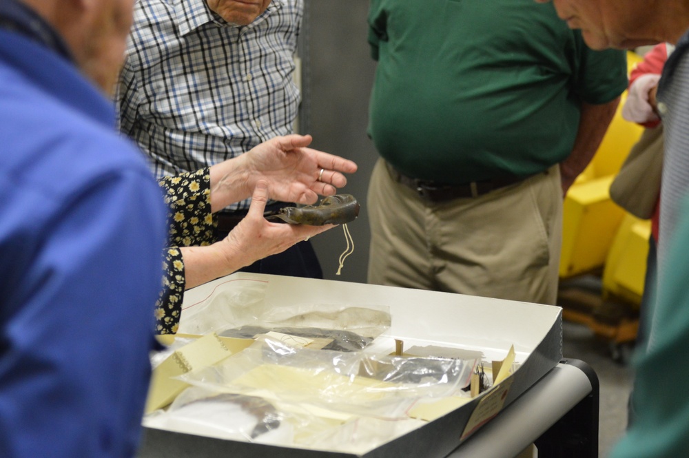 Museum volunteers visit artifact storage facility