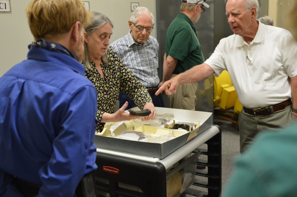 Museum volunteers visit artifact storage facility