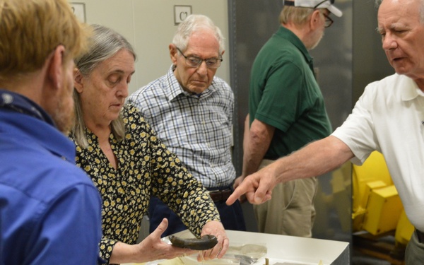 Museum volunteers visit artifact storage facility