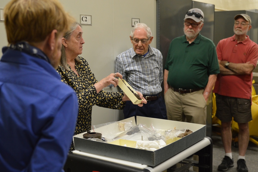 Museum volunteers visit artifact storage facility