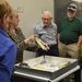 Museum volunteers visit artifact storage facility