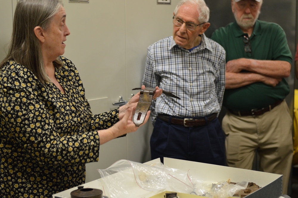 Museum volunteers visit artifact storage facility