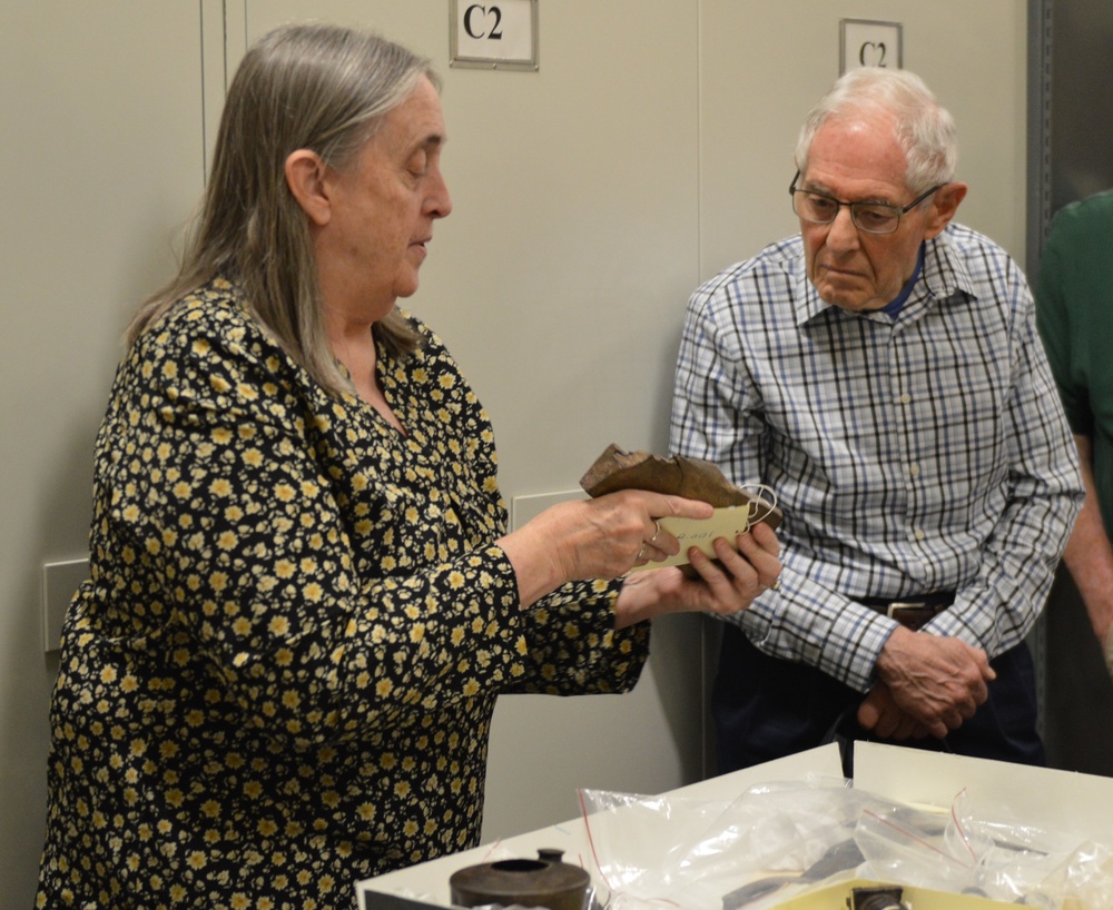 Museum volunteers visit artifact storage facility