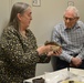 Museum volunteers visit artifact storage facility