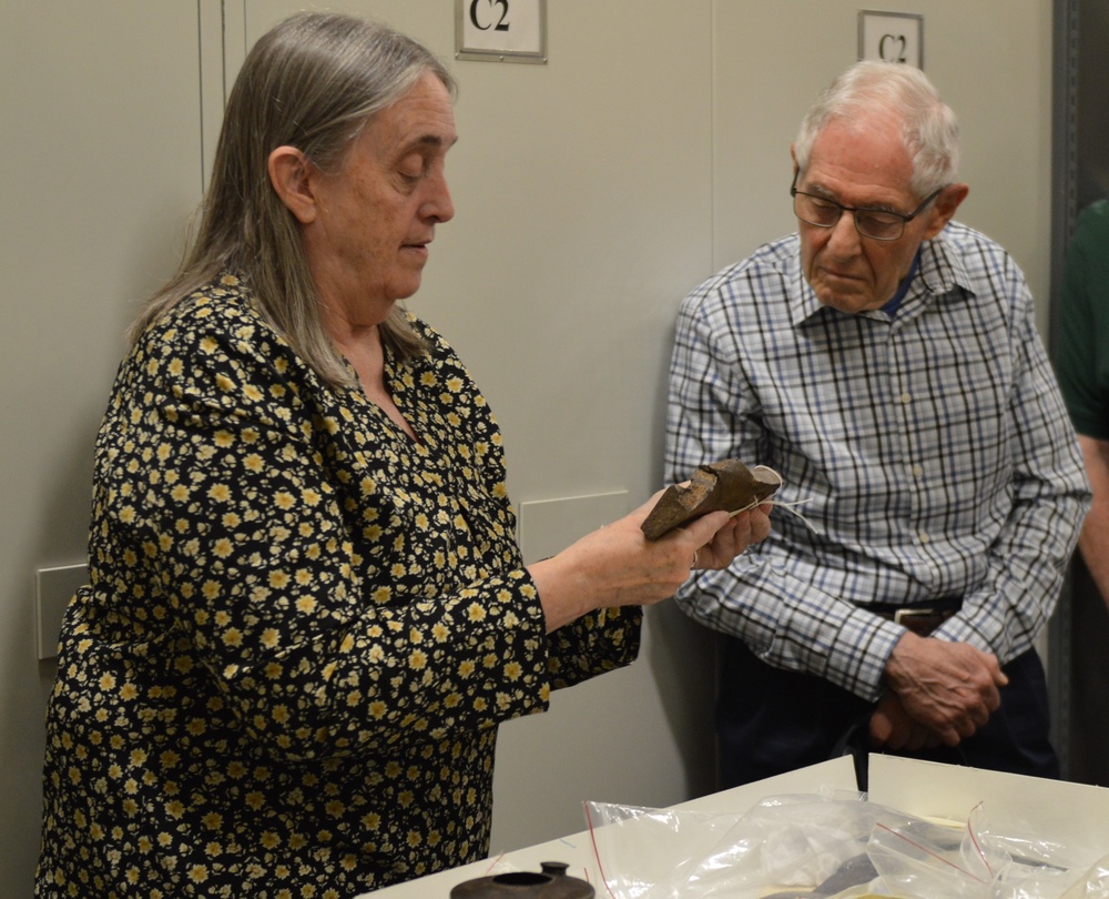 Museum volunteers visit artifact storage facility