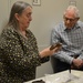 Museum volunteers visit artifact storage facility