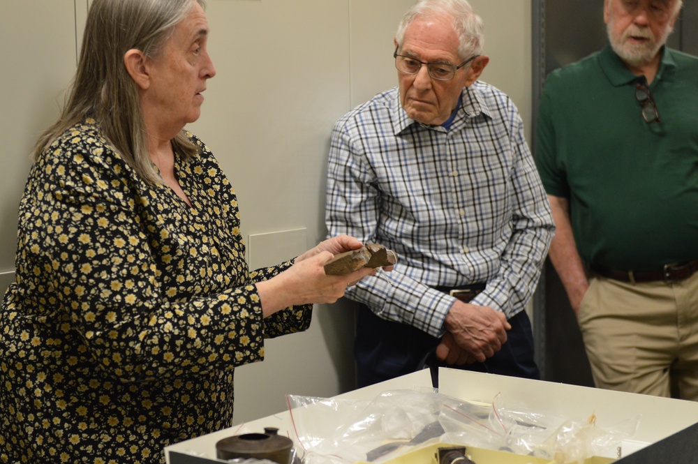 Museum volunteers visit artifact storage facility