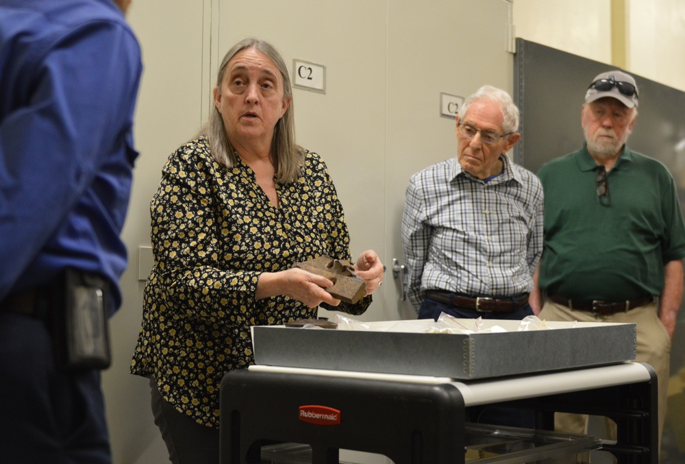 Museum volunteers visit artifact storage facility