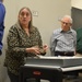 Museum volunteers visit artifact storage facility