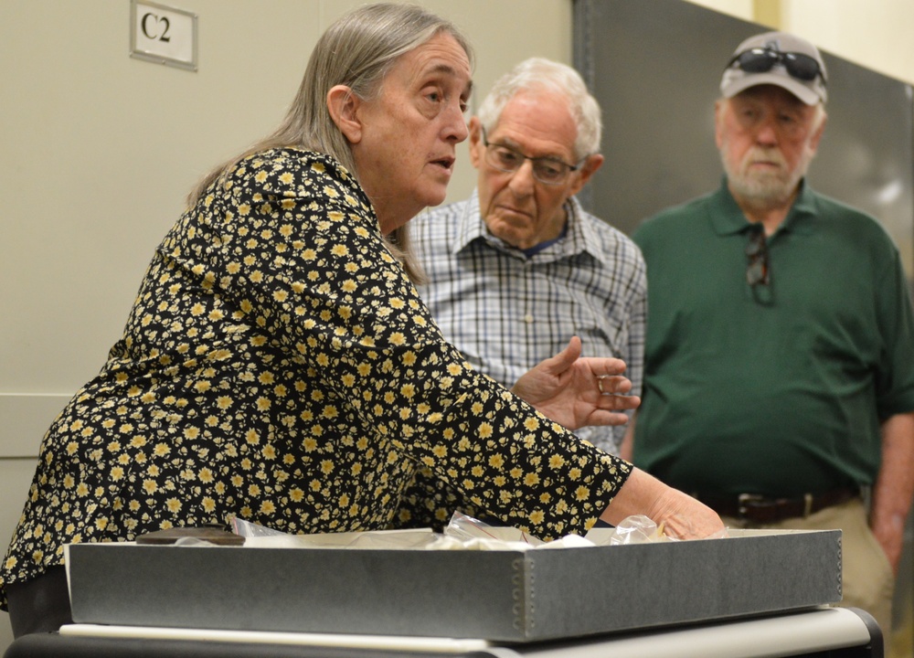 Museum volunteers visit artifact storage facility